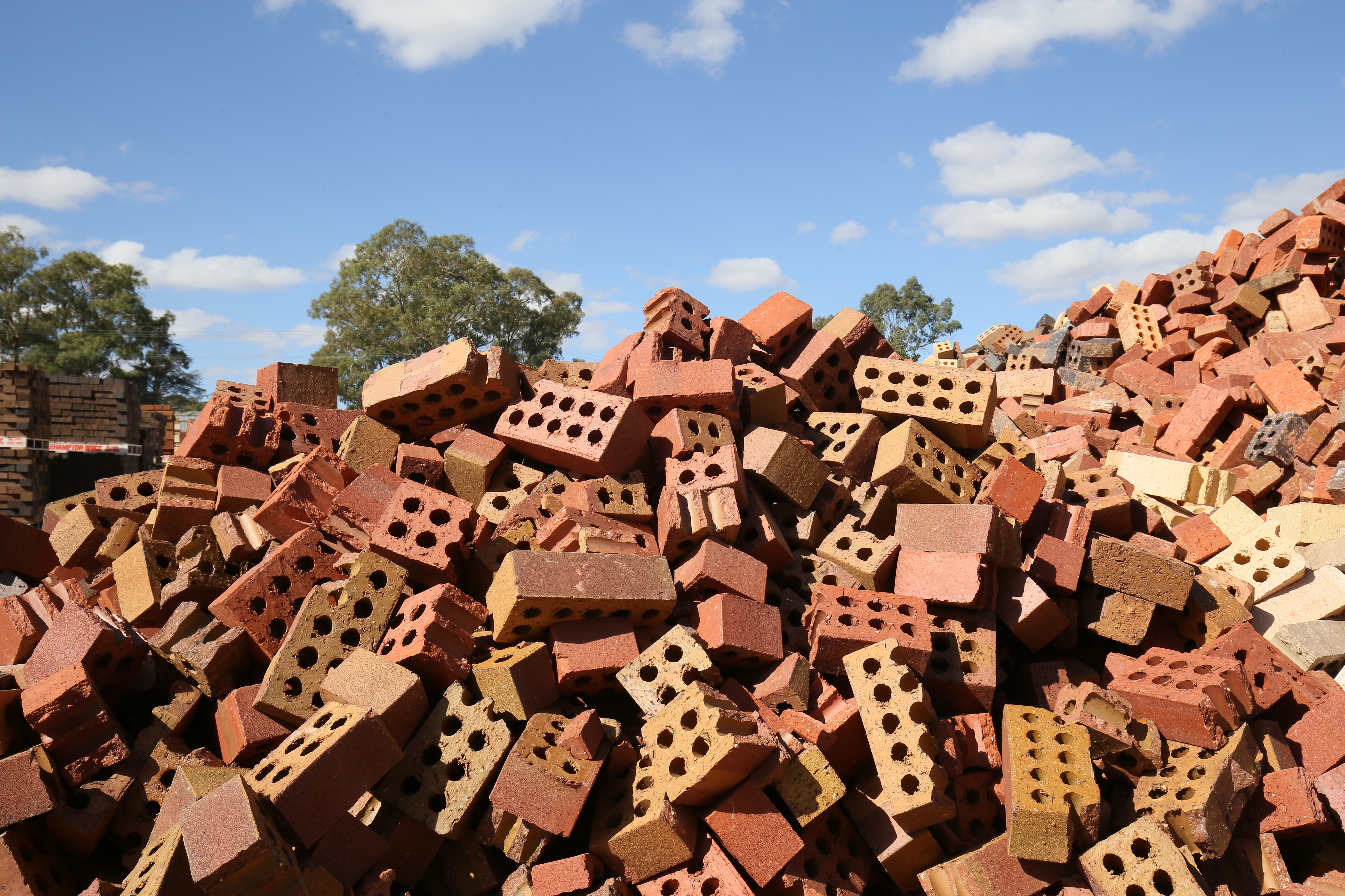Image shows a pile of bricks